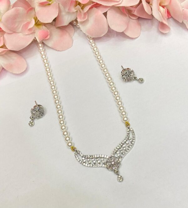 Geneva Pendant with Pearl Tarsel