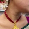 Shankho design pendant with tarsel with ear set