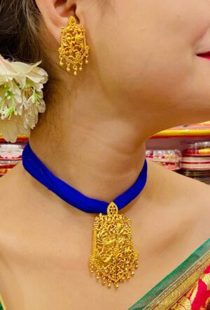 Temple style pendant set with ear ring