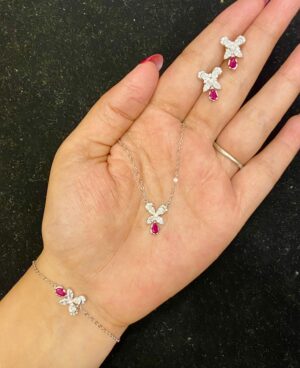 WhatsApp Image 2025-11-22 at 4.36.27 PM 92.5 Pure Silver Pink Drop Flower Design Chain Pendant With Earrings And Bracelet