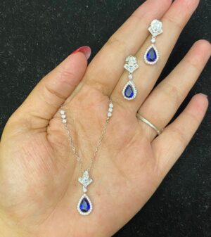 WhatsApp Image 2025-11-22 at 4.40.26 PM 92.5 Pure Silver Blue Stone Drop Design Chain Pendant With Earrings