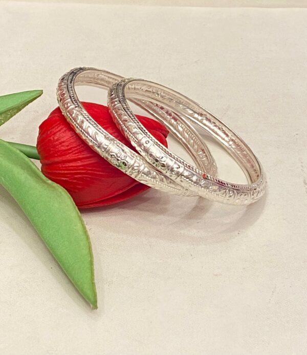 WhatsApp Image 2026-02-07 at 1.04.28 PM (1) 92.5 Pure Silver Flower Design Bauti Bangle (Pair) (CN 20-93)