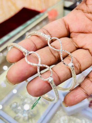 WhatsApp Image 2026-06-05 at 6.00.13 PM (1) 92.5 Pure Silver Infinity Bangle (Pair) (CN 16)